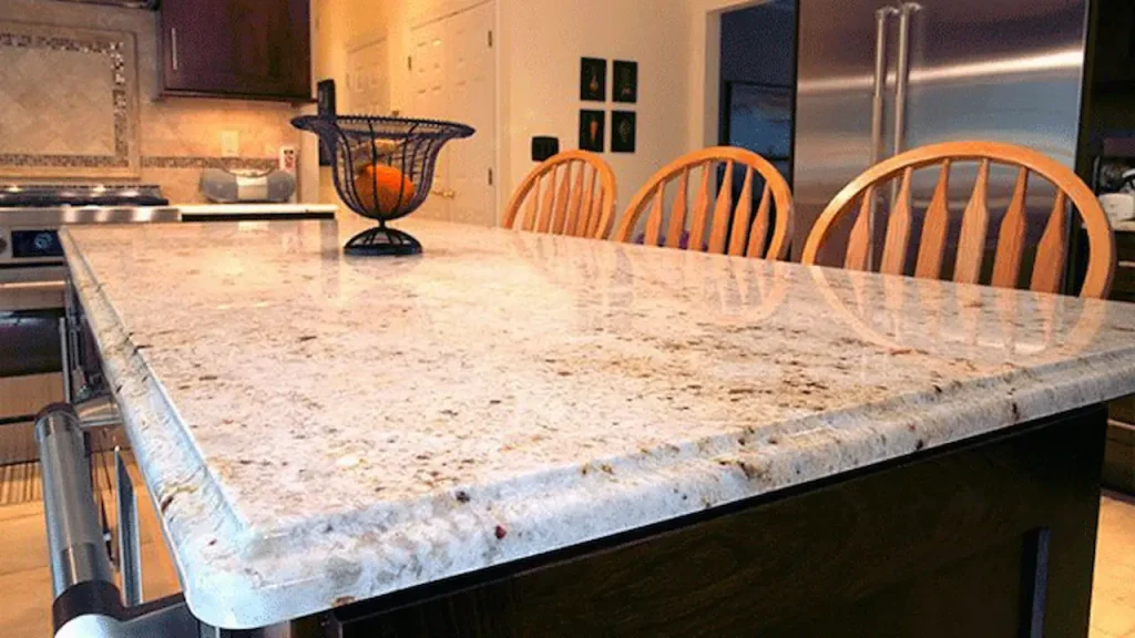 Granite kitchen countertop with rounded edge profile in a modern home kitchen